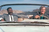 Und wieder 48 Stunden – Reggie Hammond (Eddie Murphy,l.) sitzt noch genau einen Tag im Knast, schon steht sein Leben auf dem Spiel: Der brutale Drogenchef The Iceman nämlich will seinen Tod. Das weiß der Cop Jack Cates (Nick Nolte,r.), seit Jahren hinter Iceman her. Cates weiß auch, dass er ohne Hammond selbst bald eingebuchtet wird. Deshalb braucht er, ob er will oder nicht, wieder einmal Hammonds Hilfe.