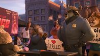 Zoomania+ – l-r:Clawhauser (Nate Torrence), Chief Bogo (Idris Elba)