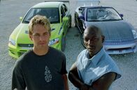 2 Fast 2 Furious – From left: Brian O'Conner (Paul Walker) and Roman Pearce (Tyrese Gibson).