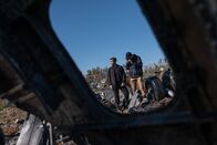 Mayday - Alarm im Cockpit – REENACTMENT - The Main Investigator (played by RJ Parrish) surveys the crash site of US-Bangla Airlines Flight 211, while another investigator documents the wreckage. (Cineflix 2020/Darren Goldstein)