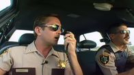 Reno 911! – L-R: Lieutenant Jim Dangle (Thomas Lennon), Deputy Travis Junior (Robert Ben Garant)