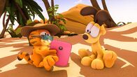 Garfield – Garfield verliert sich in Urlaubsphantasien.