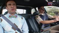 Reno 911! – L-R: Reading Ron (Brian Unger), Deputy Travis Junior (Robert Ben Garant)
