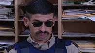 Reno 911! – Deputy Travis Junior (Robert Ben Garant)