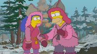 Die Simpsons – Marge (l.); Homer (r.)