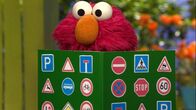 Sesamstraße – Interessiert sich für Verkehrsschilder: Elmo