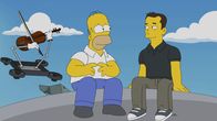 Die Simpsons – Sehr zu Homers (l.) Freude sorgt Elon (r.) nicht nur für ein ausgezeichnetes Essen ...