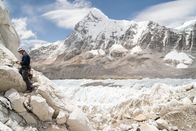 Expedition Everest – Geologist Peter Strand collects rock samples near Everest Base Camp as part of the National Geographic and Rolex Perpetual Planet Everest Expedition. (National Geographic Society/Brittany Mumma)