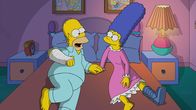 Die Simpsons – Homer (l.); Marge (r.)