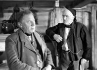 Uli der Knecht – Uli der Knecht Diskutieren über den Knecht Uli: Heinrich Gretler als Bodenbauer, Emil Hegetschweiler als Glunggebauer