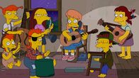 Die Simpsons – Mary Spuckler (3.v.r.) hat einen ganz besonderen Song für Bart ...