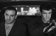 Der Panther wird gehetzt – Abel Davos (Lino Ventura, li.) muss sich auf die Hilfe des Fremden Eric Stark (Jean-Paul Belmondo, re.) verlassen, nachdem seine Freunde ihm jegliche Unterstützung auf seiner Flucht verweigert haben.