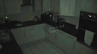 Unheimliche Videos - Wahrheit oder Fake? – A poltergeist opens drawers and cabinets and tosses items in the kitchen of a man's home in York, England