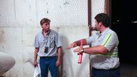 Airplane Repo - Die Inkasso-Piloten – Kevin and another man near the jet in the hangar.