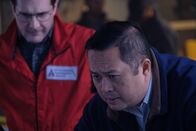 Mayday - Alarm im Cockpit – A Nepalese investigator (played by Leon Aureus) and Andrew Robinson (played by Philip Graeme) map out the trajectory of Pakistan International Airlines Flight 268's stepped descent over the Himalayan mountains that led to the tragic accident. (Cineflix 2019/Darren Goldstein)