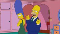 Die Simpsons – Marge (l.); Homer (r.)