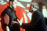 Running Man – L-R: Ben Richards (Arnold Schwarzenegger), Damon Killian (Richard Dawson)