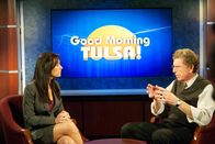 Flucht ins All – DRAMATIZATION: A scientific analyst on "Good Morning Tulsa!" explains to viewers that the approaching Neutron Star will destroy the Earth and everything on it in 75 years.