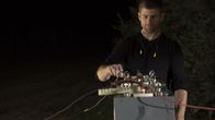 Geheimakte Tesla – Aron Koscko, Builder of the "Death Ray" during Tesla Coil electrical output test.