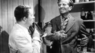 Schock – L-R: The Chemist (Toke Townley), Victor Carroon (Richard Wordsworth)