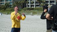 When Sharks Attack - Hai-Alarm – Witness, Denny Starr, on beach with the film crew. (National Geographic/Karen Sloan)