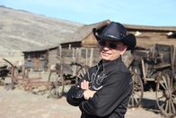 Hotel Impossible – Host Anthony Melchiorri poses in front of Old Trail Town Cody, Wyoming as seen on Travel Channel's Hotel Impossible.