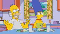 Die Simpsons – Homer (l.); Marge (r.)