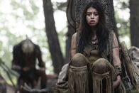 Prey – (L-R): Dane DiLiegro as the Predator and Amber Midthunder as Naru in 20th Century Studios' PREY, exclusively on Hulu. Photo by David Bukach.