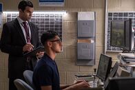 Mayday - Alarm im Cockpit – REENACTMENT - The Main Investigator (played by RJ Parrish) and an investigative assistant review CCTV footage of US-Bangla Airlines Flight 211's crash landing. (Cineflix 2020/Darren Goldstein)