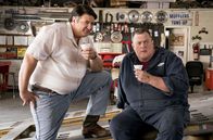 Young Sheldon – L-R: George Cooper Sr. (Lance Barber), Herschel Sparks (Billy Gardell).