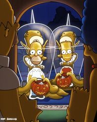 Die Simpsons – Um sich vor ihren Verfolgern zu verstecken, schlüpfen Homer (l.) und Bart (r.) in eine Fotopappwand.