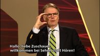 Sehen statt Hören – Moderator Jürgen Stachlewitz.