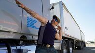 Asphalt-Cowboys – Truck driver posing.