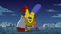 Die Simpsons – Homer (l.); Marge (r.)
