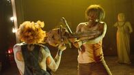 31 - A Rob Zombie Film – L-R: Schizo-Head (David Ury), Panda Thomas (Lawrence-Hilton Jacobs)