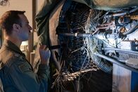 Mayday - Alarm im Cockpit – REENACTMENT - Lt. Colonel Ike Stokes (played by Mathieu Bourassa) examines an engine that departed a US Air Force KC-135 during Operation Desert Storm. (Cineflix 2020/Darren Goldstein)