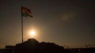 Chain of Command – Mosul, Iraq - A Peshmerga flag in the sun (National Geographic/Brian Lovett)
