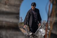 Mayday - Alarm im Cockpit – REENACTMENT - The Main Investigator (played by RJ Parrish) surveys and analyzes the wreckage left from US-Bangla Airlines Flight 211. (Cineflix 2020/Darren Goldstein)