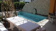 Hotel Impossible – The pool area at Litohoro Olympus Resort after renovation, as seen on Travel Channel's Hotel Impossible.