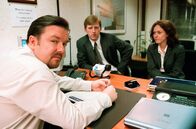 The Office – L-R: David Brent (Ricky Gervais), Ray (Tom Goodman-Hill), Jude (Jennifer Hennessy) Picture Shows: David meets Ray & Jude about his management speech Series Two of the BAFTA winning comedy, the painfully accurate portrait of the modern work-place that leaves you either counting your blessings or questioning your career. David Brent tries to assimilate the new Swindon intake, a group of well-trained and highly motivated personnel. It should be an easy job. Sadly, someone forgot to tell them they're meant to laugh at everything David says. Unlucky-in-love Tim finds his fortune changing, we discover there's more to demure Dawn than first meets the eye, but there's even less to Gareth. The photography may only be used for publicity purposes in connection with the broadcast of the programme as licensed by BBC Worldwide Ltd and must carry the shown copyright legend. It may not be used for any commercial purpose without a licence from the BBC.