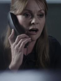 Obsession - Dunkles Verlangen – Michelle (Andrée Bernard) talking on the phone.
