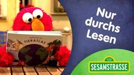 Sesamstraße – Elmo überzeugt Wolf, den Lesemuffel, mit einem Song, das Lesen toll ist.