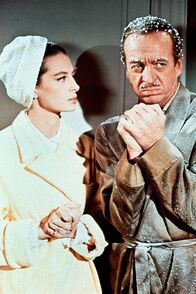 Der rosarote Panther – Sir Charles Lytton (David Niven) alias "Das Phantom" hat sich vor Inspektor Clouseau, der ihn entlarven will, zu dessen schöner Frau Simone (Capucine) geflüchtet.