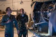 Mayday - Alarm im Cockpit – REENACTMENT - Lt. Colonel Ike Stokes (played by Mathieu Bourassa) and another Investigator examine an engine that departed a US Air Force KC-135 during Operation Desert Storm. (Cineflix 2020/Darren Goldstein)