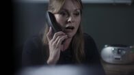 Obsession - Dunkles Verlangen – Michelle (Andrée Bernard) talking on the phone.