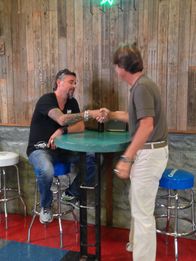 Fast N' Loud – Dennis Collins and Richard Rawlings shake hands.