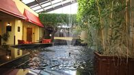 Hotel Impossible – A shot of the water garden, a feature in the lobby of the Capital Plaza Hotel in Frankfort, KY, as seen on Travel Channel's Hotel Impossible.