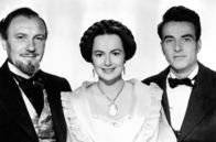 Die Erbin – Catherine Sloper (Olivia de Havilland, Mi.) zwischen ihrem Vater Dr. Austin Sloper (Ralph Richardson, li.), einem wohlhabenden New Yorker Arzt, und dem attraktiven Morris Townsend (Montgomery Clift, re.), ihrer großen, unglücklichen Liebe