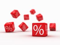 MediaShop - Immer etwas Neues – Symbols of percent on falling red cubes.