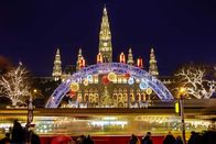 ATV - Die Reportage – The tram is ride in front of the Christmas market by City hall - Rathaus in night Vienna, Austria.